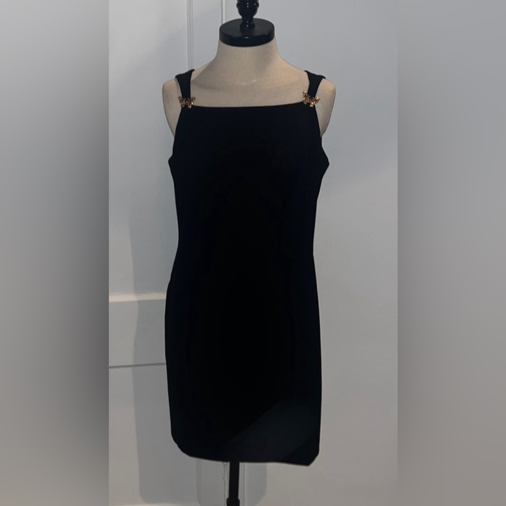 CDC black sleeveless sheath dress